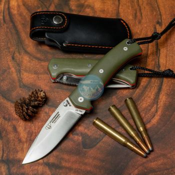 Navaja Cudeman Ranger 327-GVF con hoja de acero Böhler N-695 de 10 cm y empuñadura de G10 verde con separador naranja de 13 cm. Incluye funda de cuero negro.